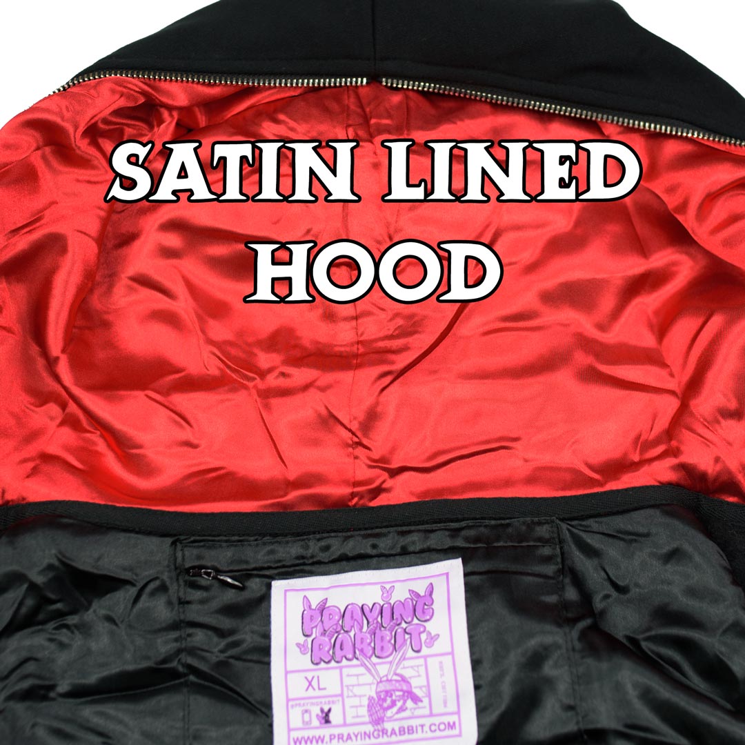 red satin lined hood with hidden zipper neck pocket below it