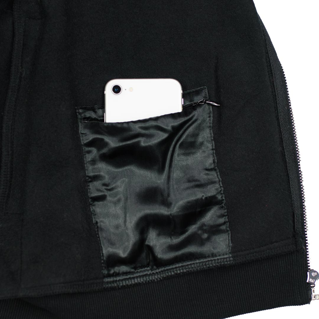 zipper stash pocket holding a phone