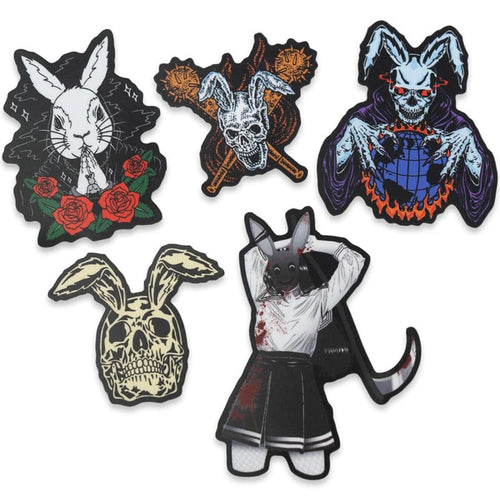 5 stickers that show a white praying rabbit with red roses, a white rabbit skull with two barbed clubs behind it, a blue devil rabbit skeleton mind controlling the earth, a yellow rabbit skull, and a school girl wearing a bunny mask holding a scythe