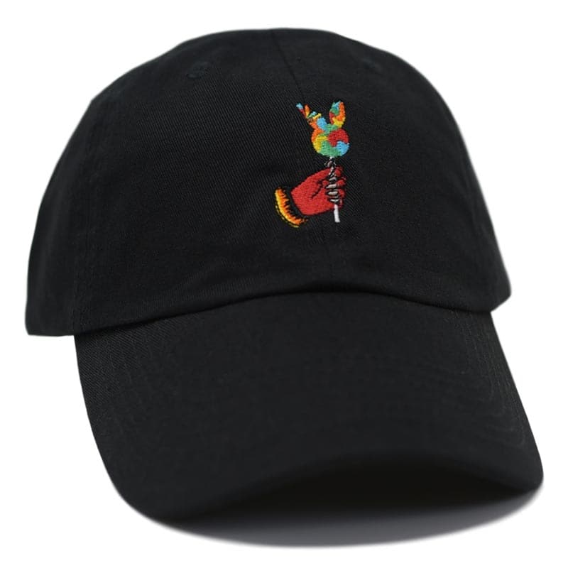 side view of a red demon hand holding a rabbit lollipop hat