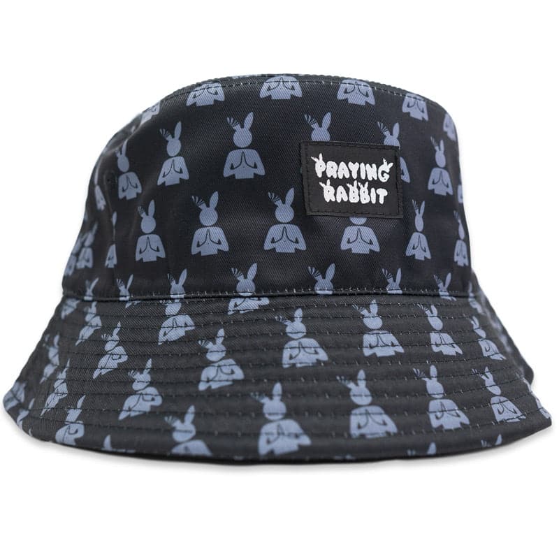 black bucket hat side view showing gray all-over print praying rabbit logo