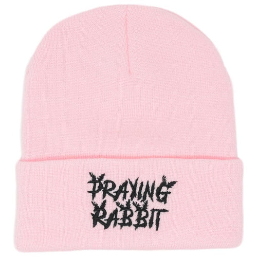 light pink beanie with an embroidered praying rabbit distressed logo