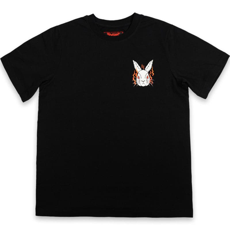 black t shirt front view with small printed white rabbit head with flames behind it on the left chest