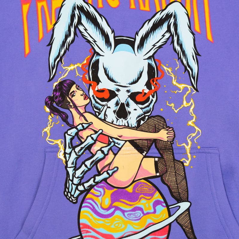 design of a blue rabbit skeleton with red glowing eyes. there is a girl in front of the rabbit sitting on top of the planet saturn. the girl has purple hair and fishnets
