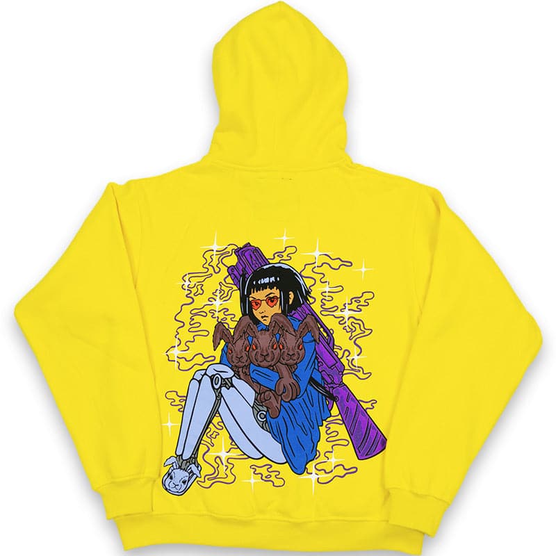 back view of yellow hoodie with a printed graphic design of robot girl holding a rabbit and she has a purple shotgun on her back