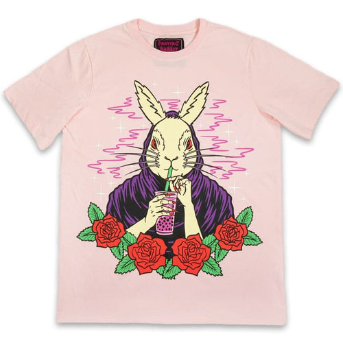 pink shirt with a rabbit drinking boba. there are 4 red roses around the rabbit.