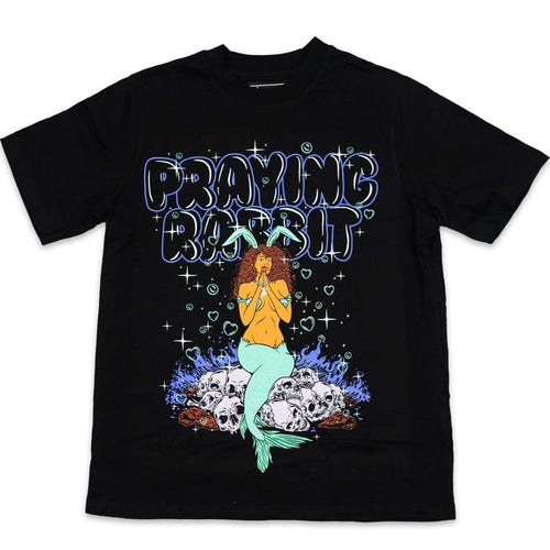 mermaid design sitting on purple skulls. she is praying with little heart bubbles around her. the top of the design has praying rabbit text