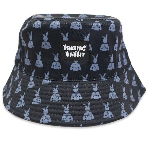 black bucket hat with an all-over print of gray praying rabbit logos