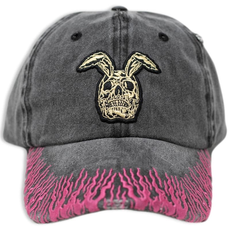 front view of rabbit skull hat with pink embroidered flames on the brim