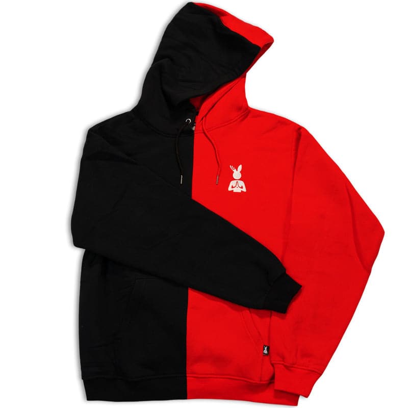 white praying rabbit logo embroidered on the left chest of a red and blue split colored hoodie