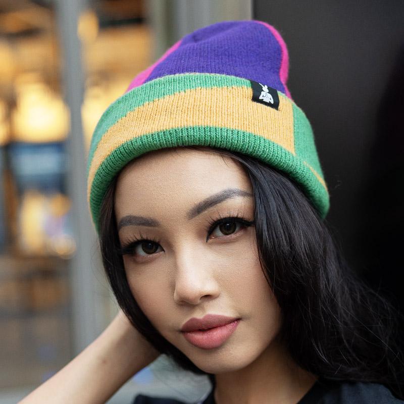 model wearing retro color block beanie