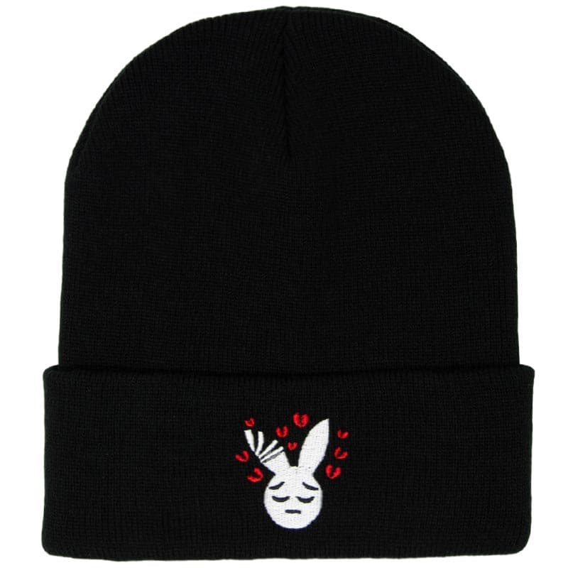sad rabbit with red broken hearts embroidered on a black beanie