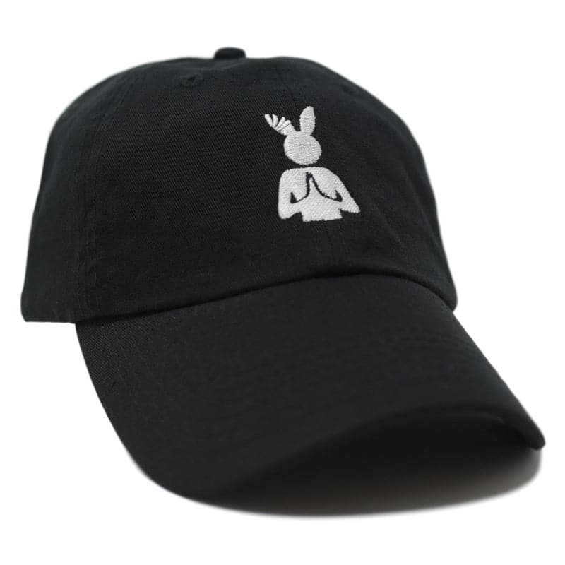side view of black hat with a white praying rabbit logo