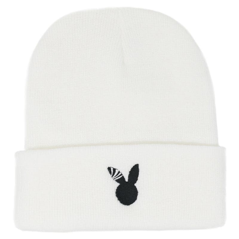 white beanie with an embroidered rabbit design