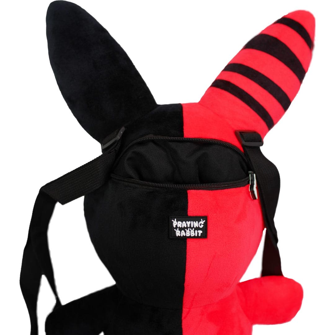 back view of soft rabbit plush bag with zipper open. it has black inside fabric